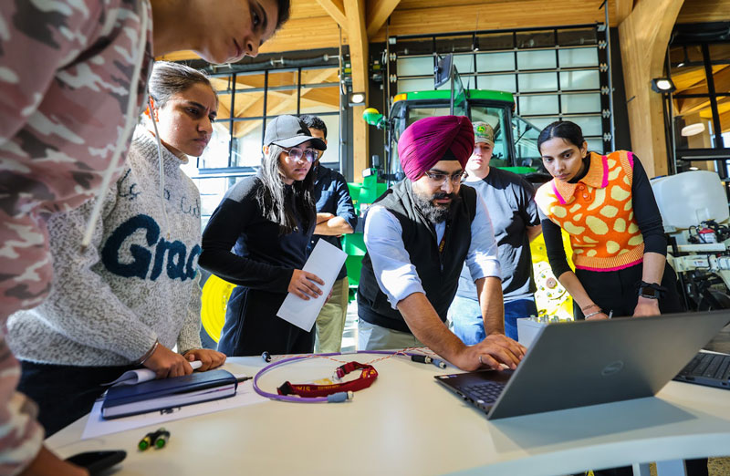 Instructor showcasing the technology in the WATC Shop