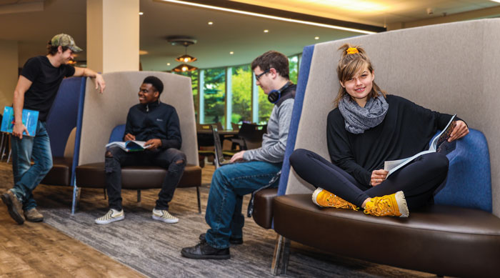 student in library