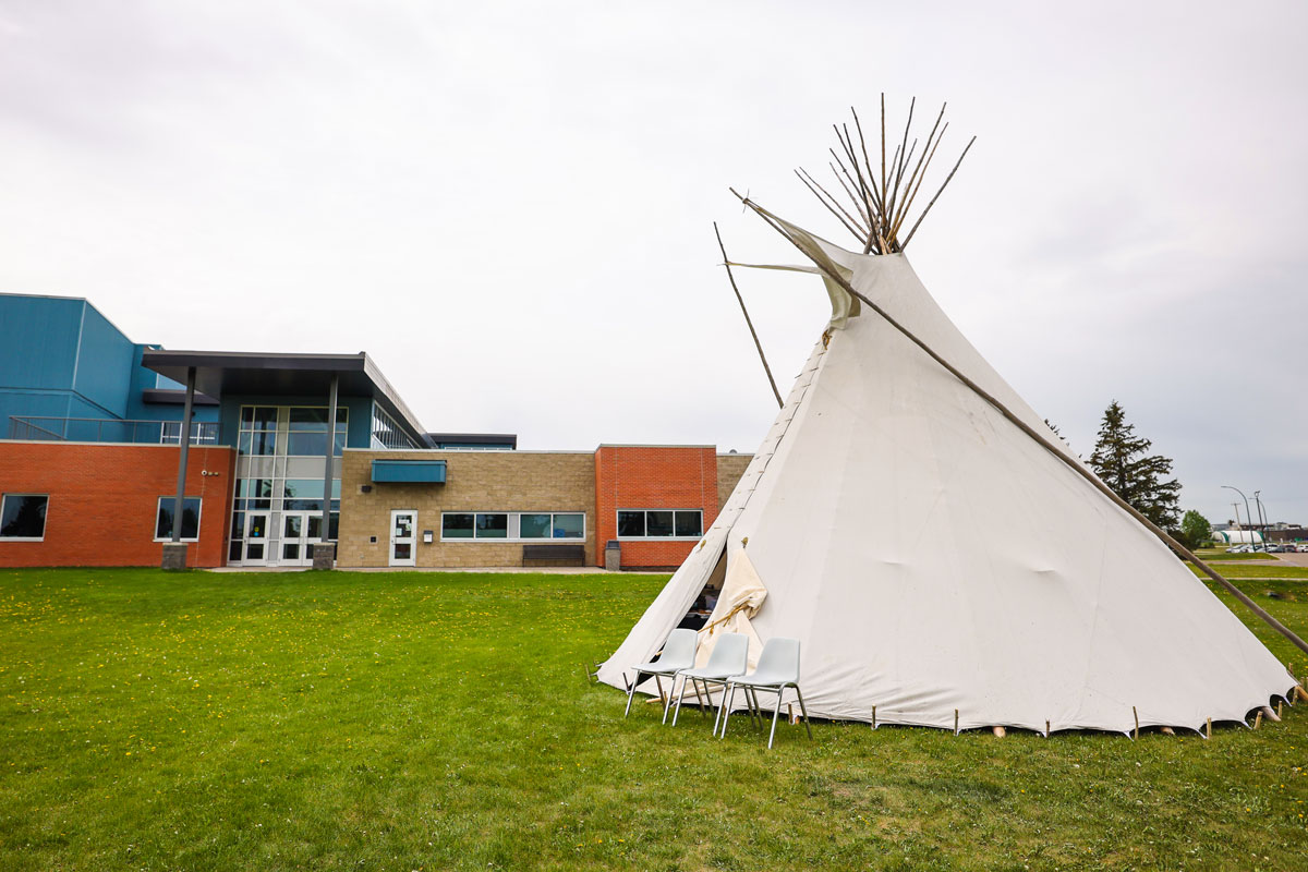 A tipi set up in front of the Community Learning Centre.