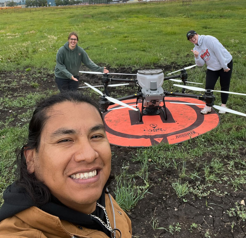 Abraham Pichardo Martinez of the Smart Agriculture team with Isabell, Ireland and a DJI Agras 250 drone.